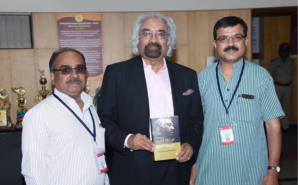 Dr. T.S.Channesh &  writer Jayaprakash Narayana with Mr. Sam Pitroda handing over the translated copy of his book  "Dreaming Big" as  "ಭಾರತ ಬೆಸುಗೆ"in Kannada.